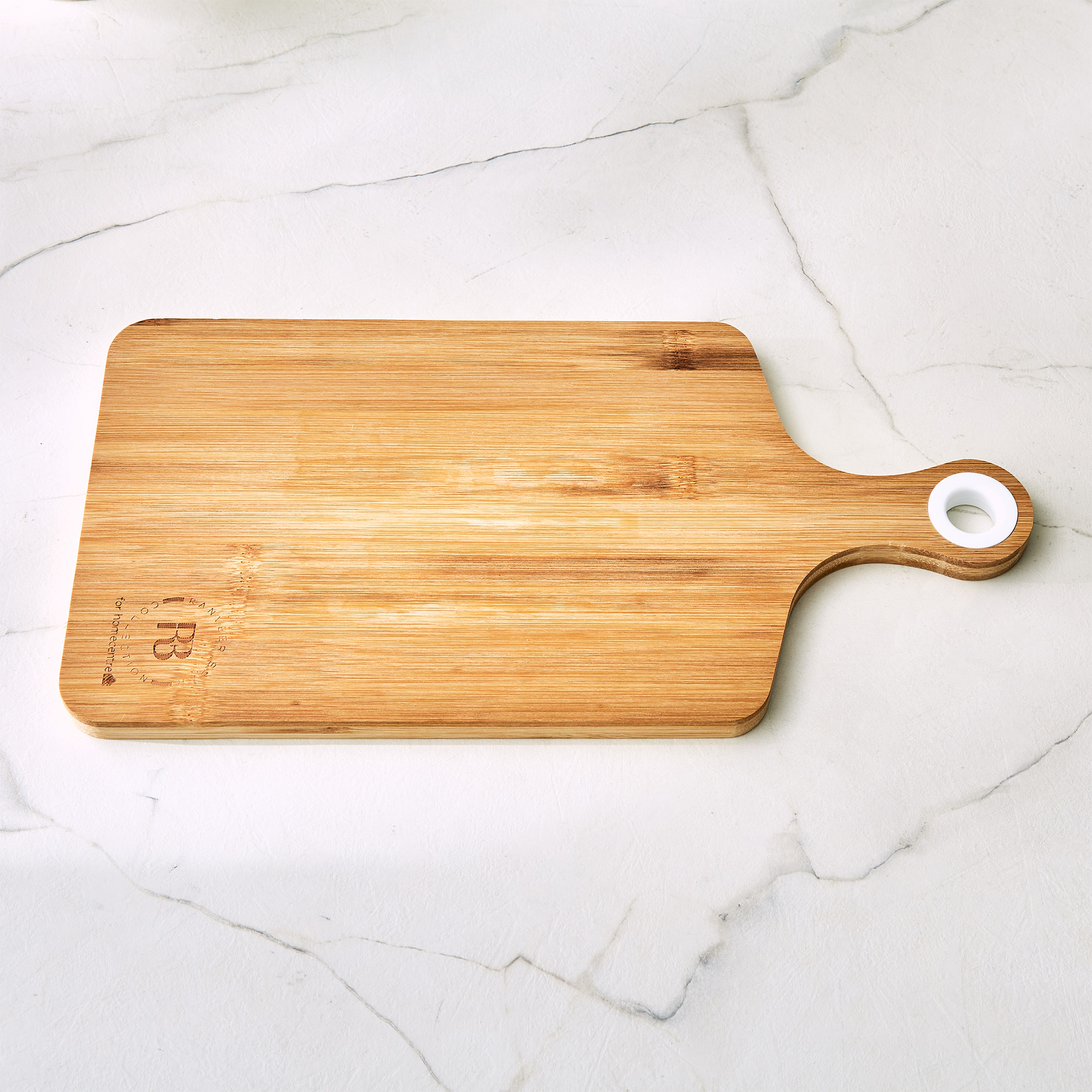 Chef Cubis Edulis Bamboo Chopping Board with Handle in Brown