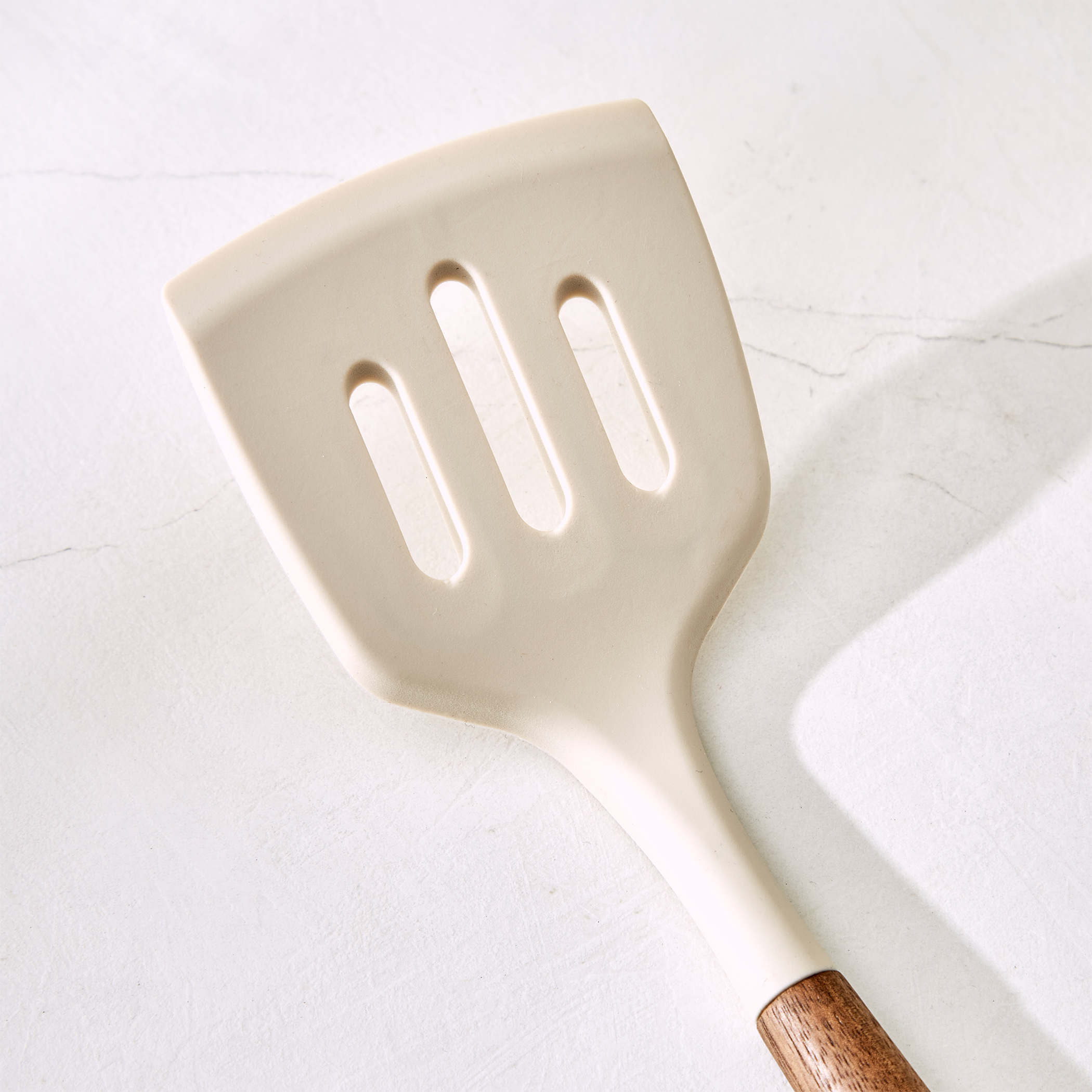 Chefs Pride Zeta Silicone Slotted Turner with Wooden Handle in Cream