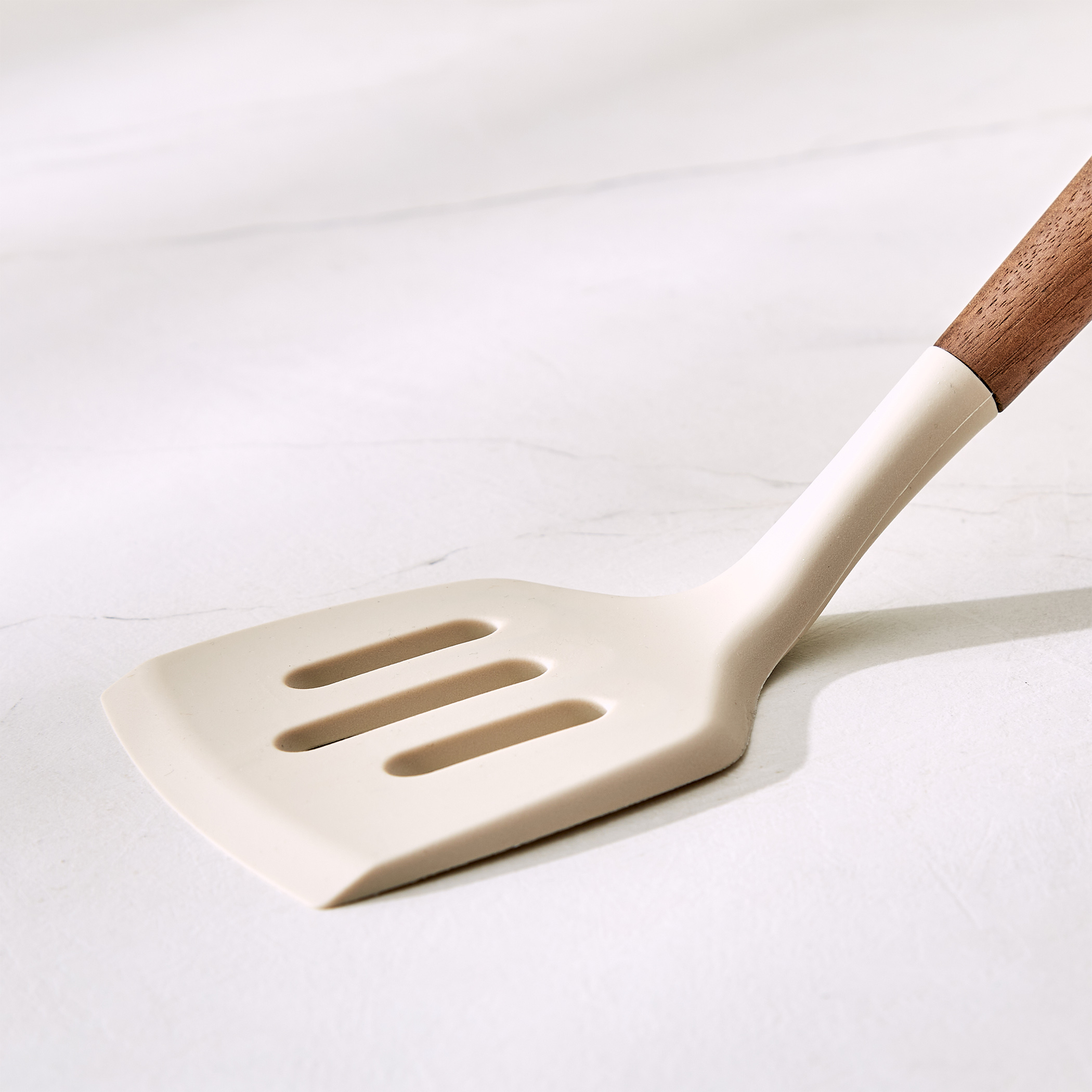 Chefs Pride Zeta Silicone Slotted Turner with Wooden Handle in Cream